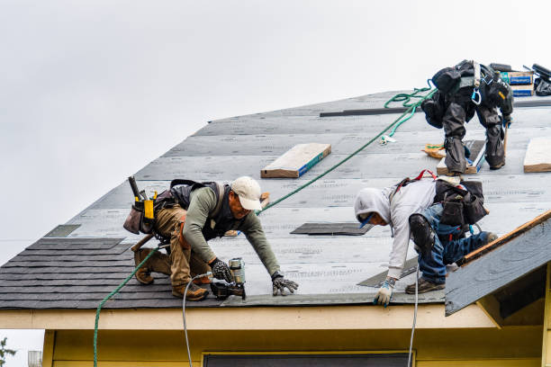 Professional Gutter Installation technician working in Newington, CT